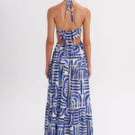 Full-length halter maxi dress in blue abstract print, made in Colombia, available at EVAMAIA