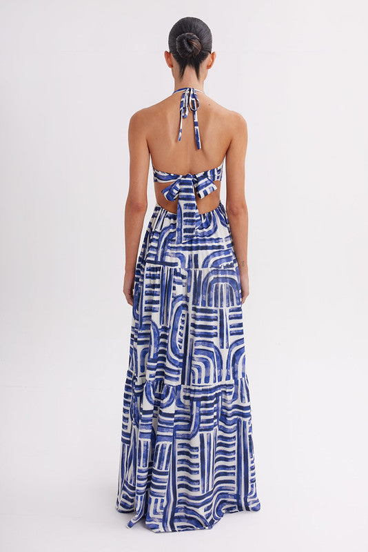 Full-length halter maxi dress in blue abstract print, made in Colombia, available at EVAMAIA
