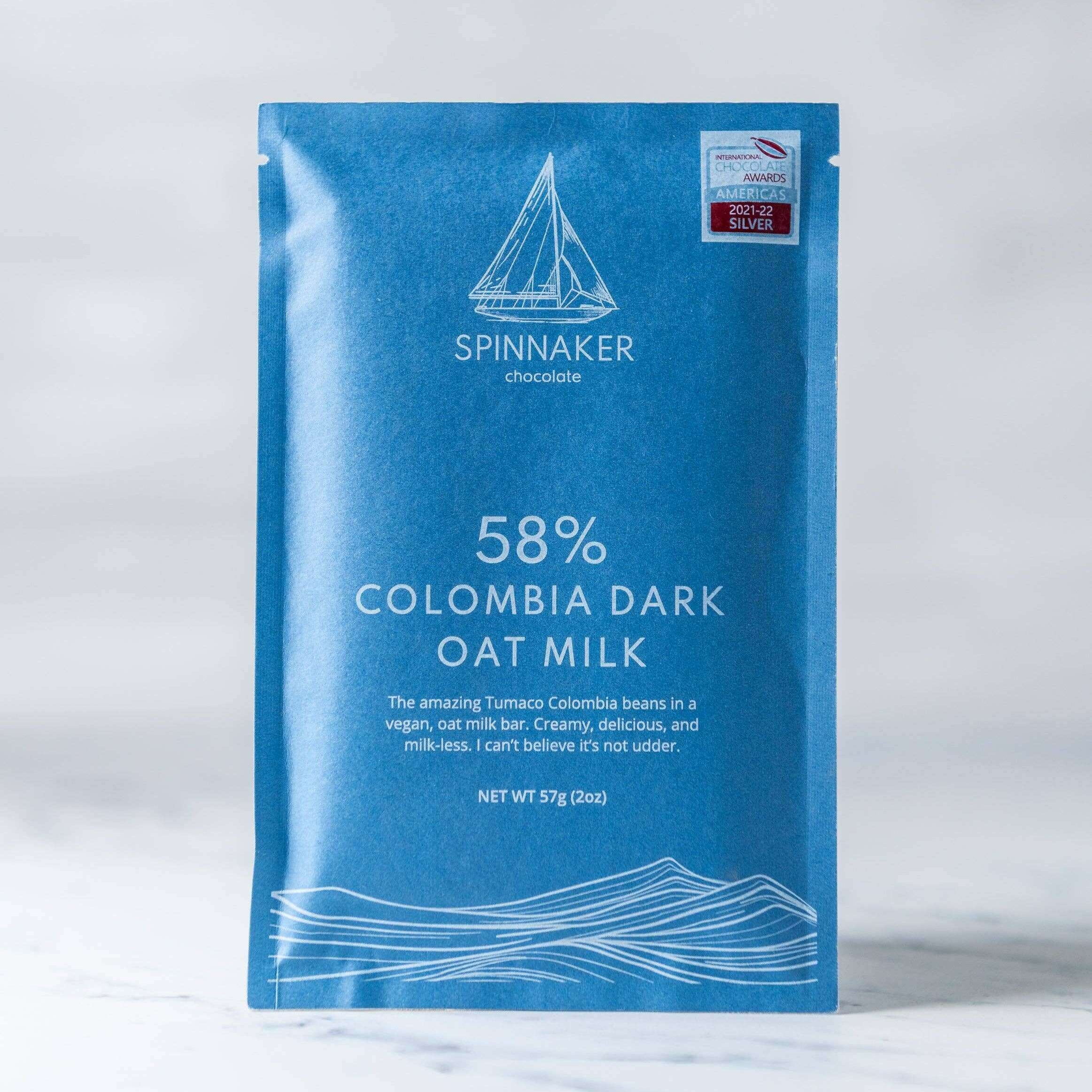 Blue Spinnaker chocolate bar packaging on a white background.