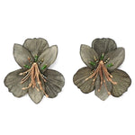 Pair of floral earrings with green and gold details on a white background