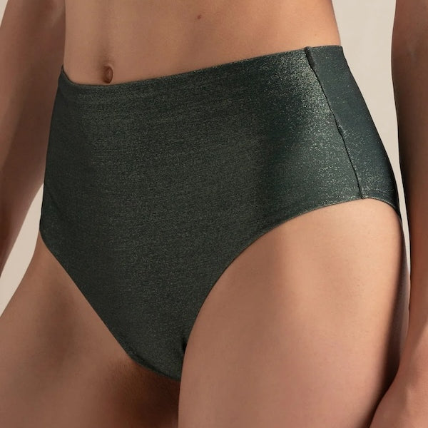 Dark green high-waisted bikini bottom on a beige background.