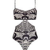 Black and white patterned one-piece swimsuit with side cut-outs on a white background. 