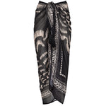 Black and white patterned scarf on a white background.