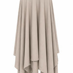 A high-waisted, flowing midi skirt in a light taupe-beige color, featuring an asymmetrical layered hemline, shown against a plain white background.