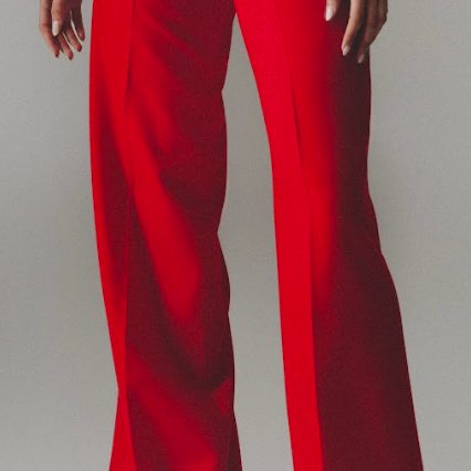 Model wearing red wool pants