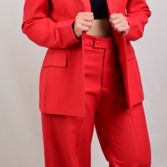 Model wearing red wool pants
