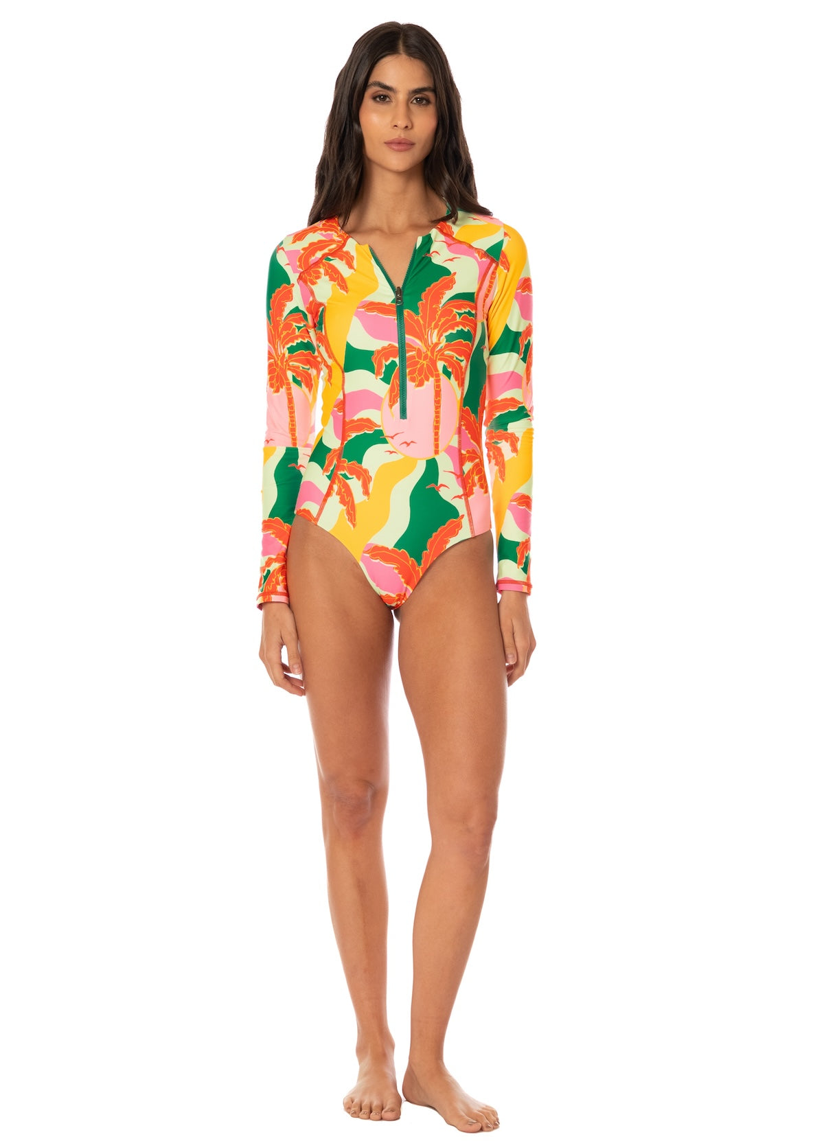 Woman wearing a colorful floral swimsuit on a white background.