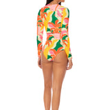 Woman wearing a colorful floral swimsuit on a white background.