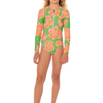 Young girl wearing a floral swimsuit on a white background