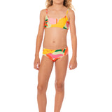 Young girl wearing a colorful bikini set on a white background.