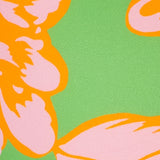 Floral pattern with pink and orange flowers on a green background.