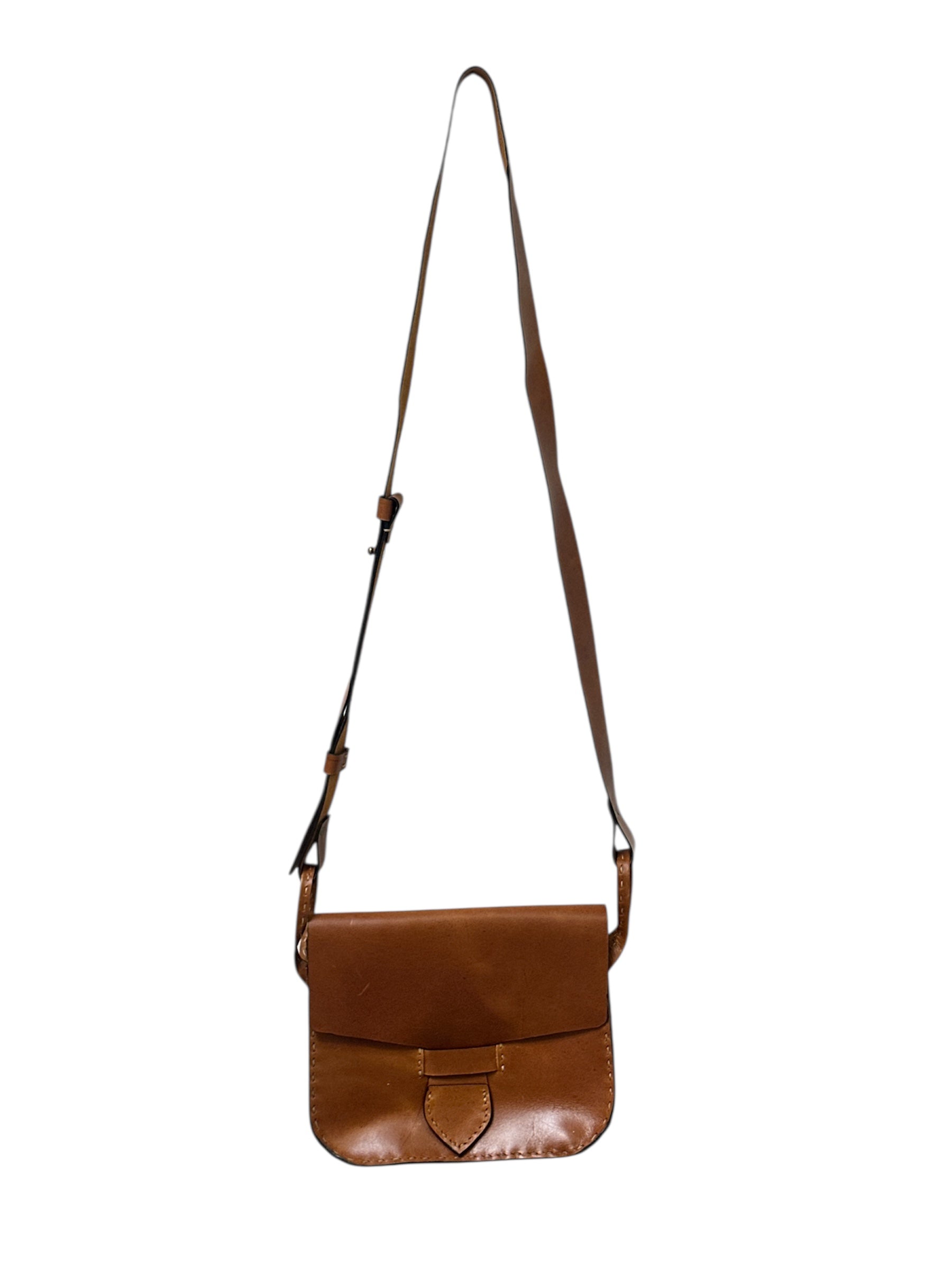 Brown leather crossbody bag on a white background.