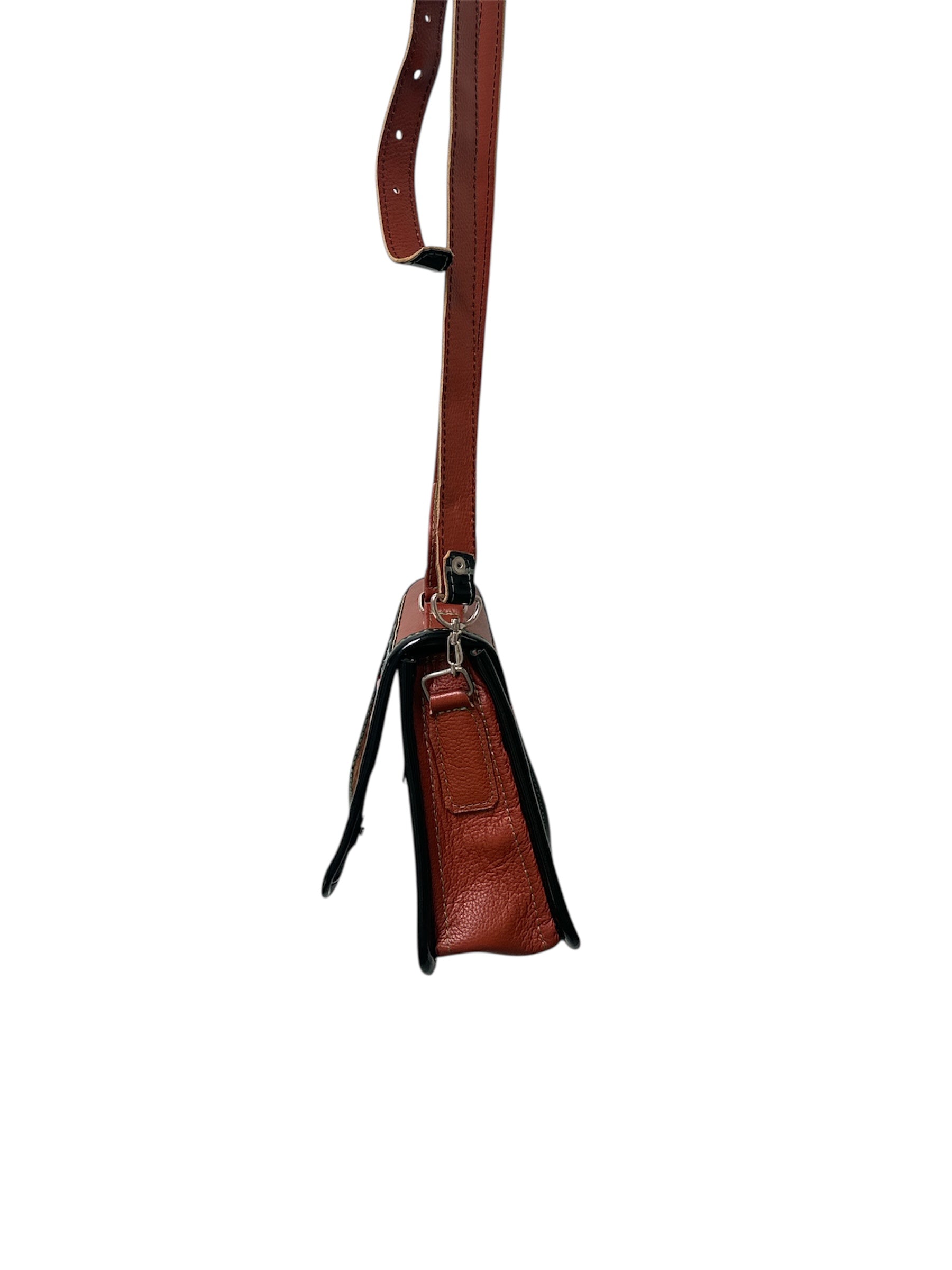Brown leather carriel bag with a strap on a white background.
