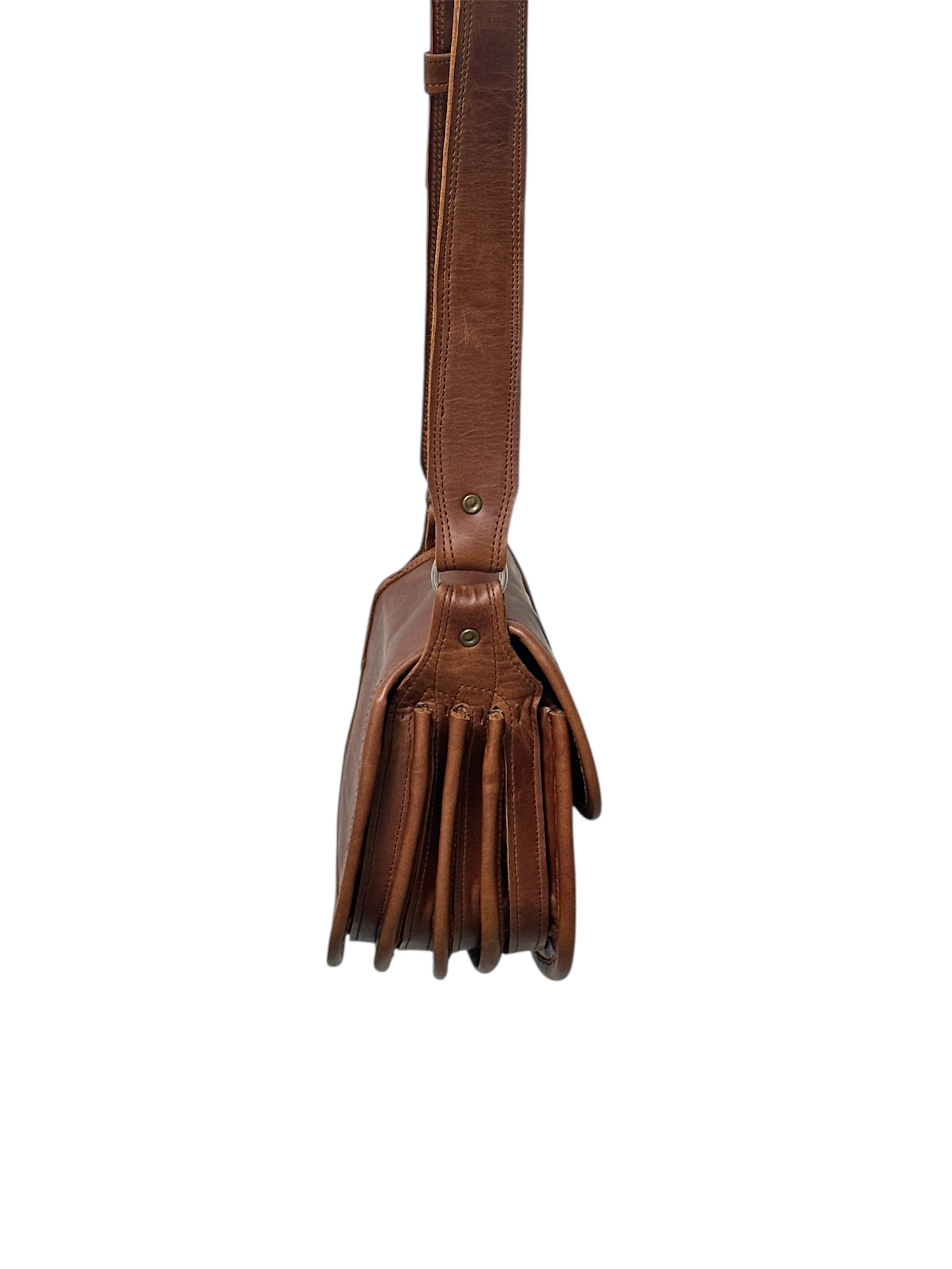 Brown leather bag with strap on a white background