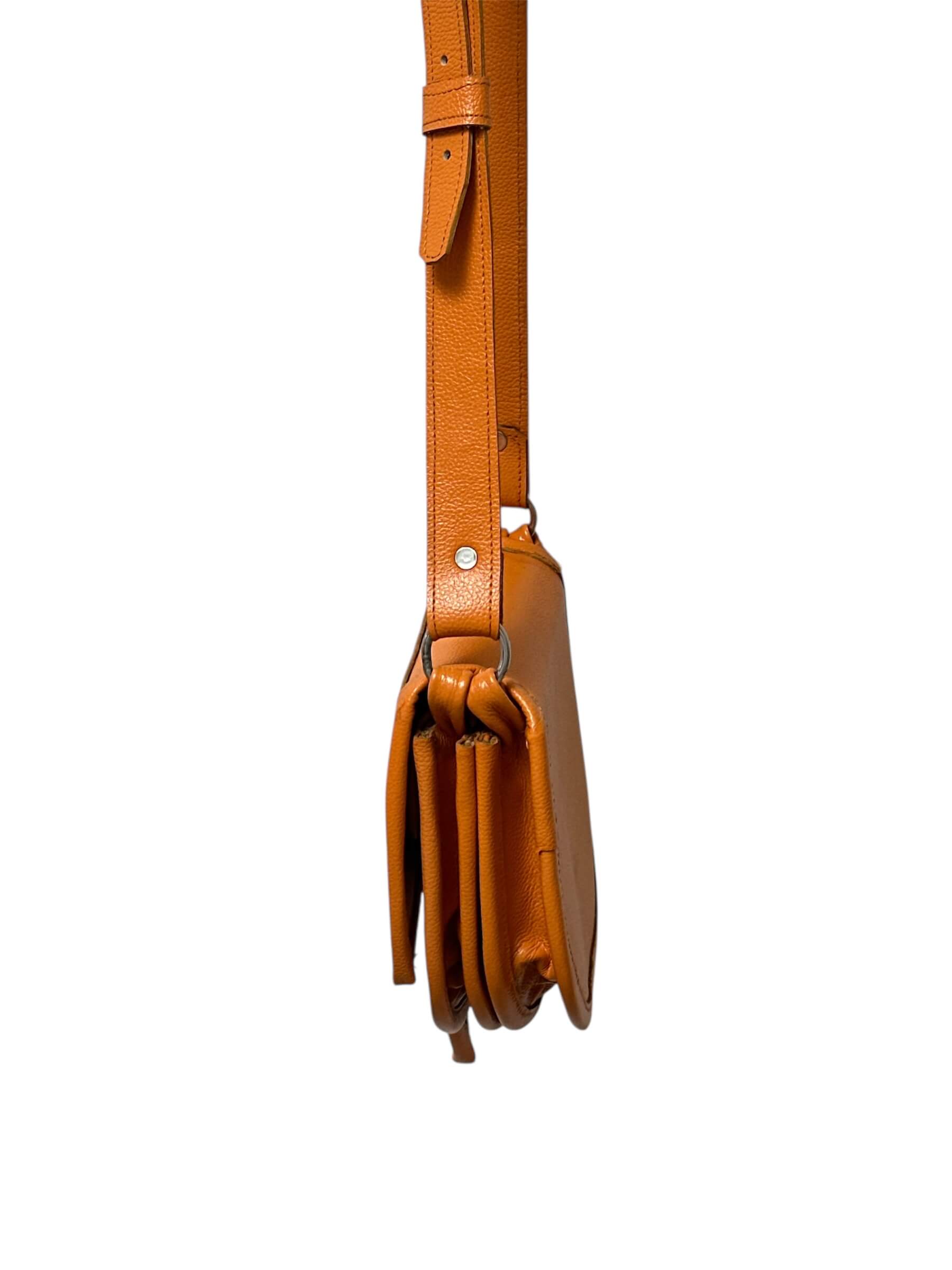 Orange carrell crossbody purse. 