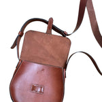 Brown leather crossbody on a white background.