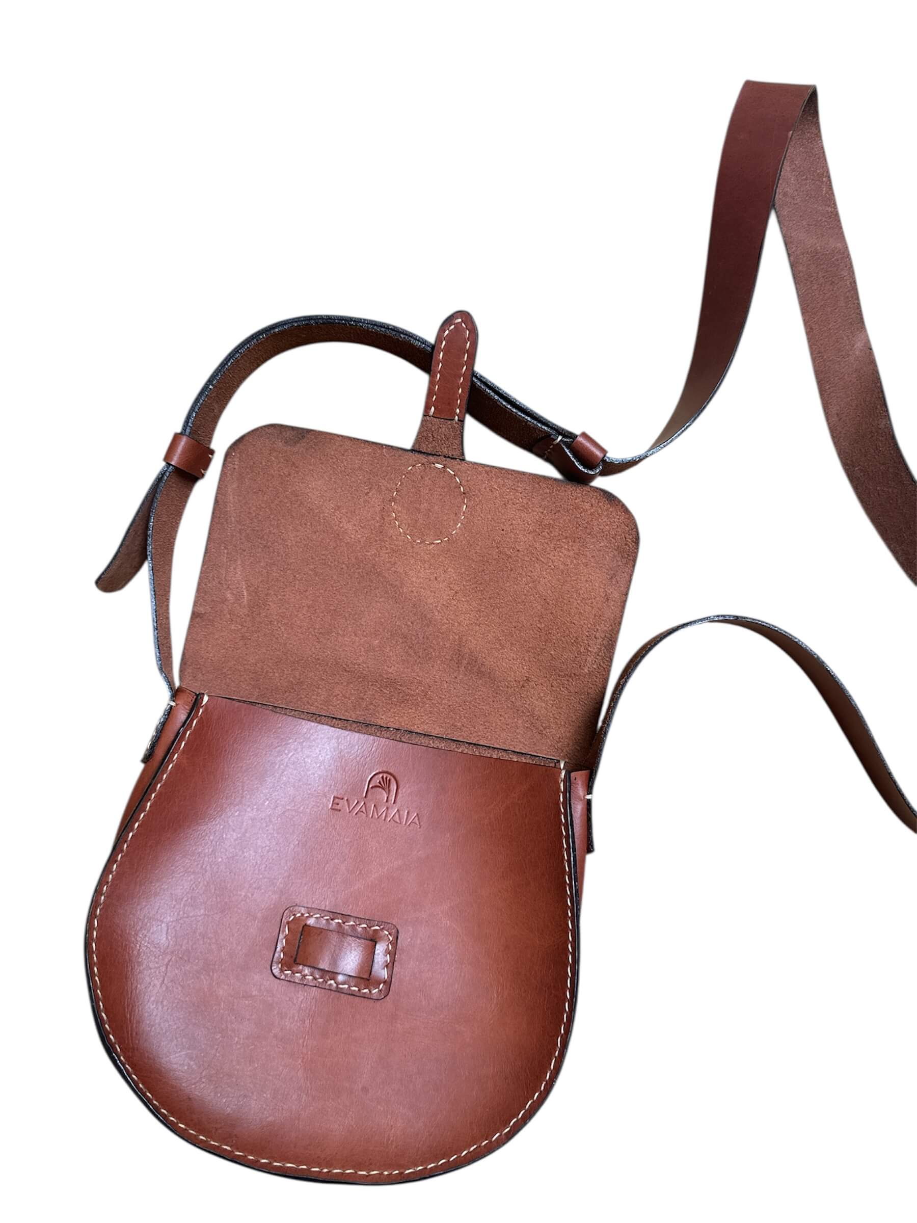 Brown leather crossbody on a white background.