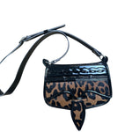 Animal print leather carriel crossbody purse. 