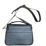 Brown and black leather crossbody carriel bag with decorative elements on a white background.