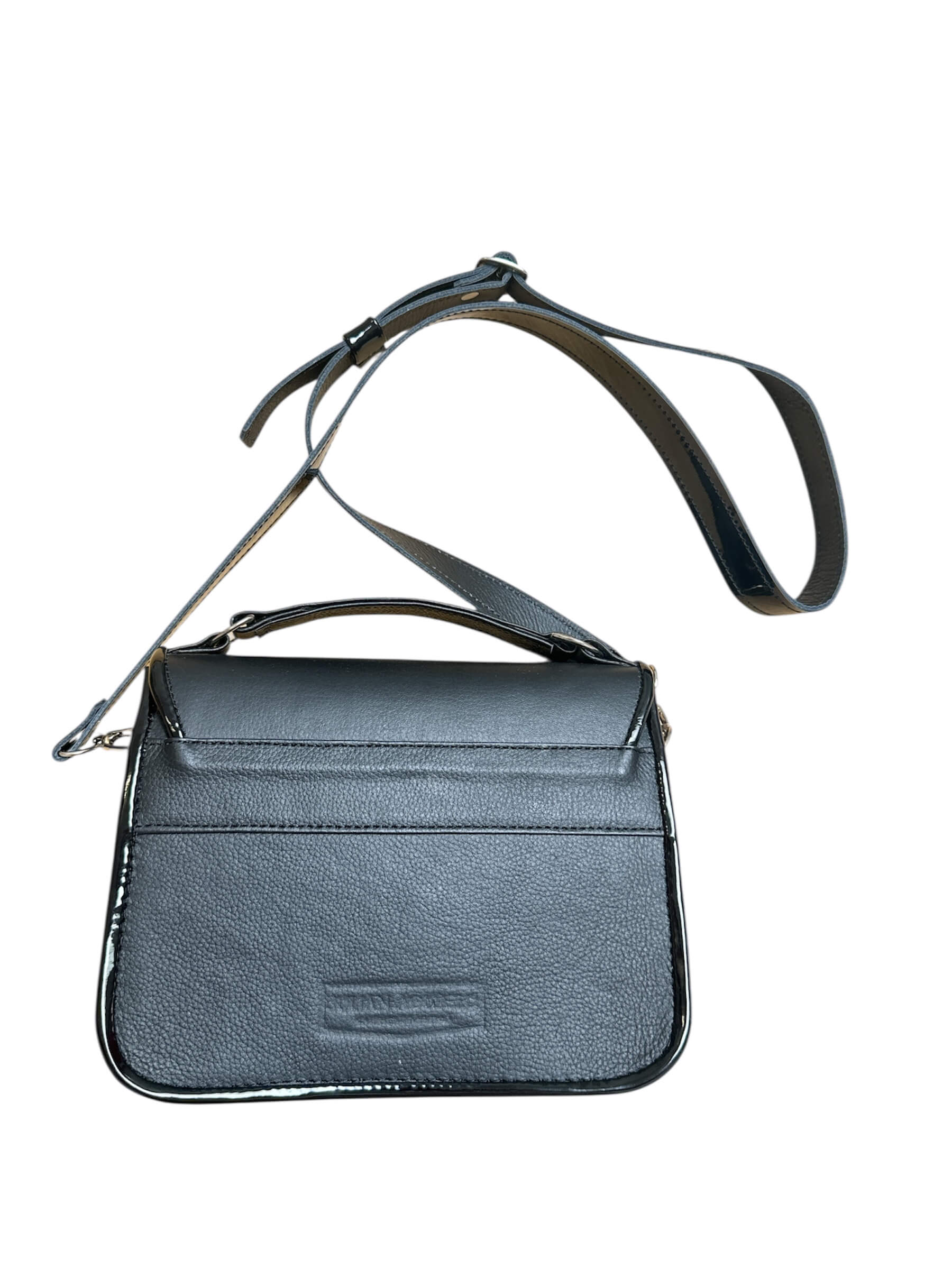 Brown and black leather crossbody carriel bag with decorative elements on a white background.