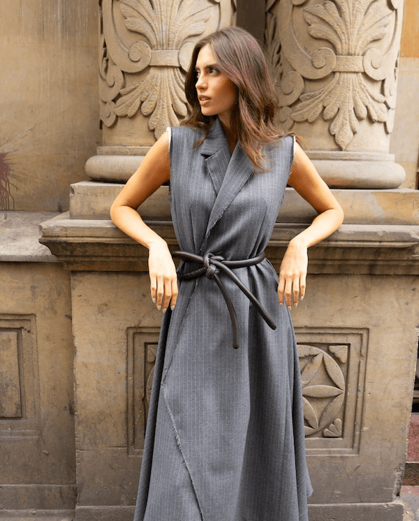 Lady wearing a coat and brown tokyo belt