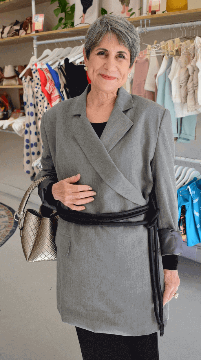 Lady wearing a coat and black tokyo belt