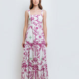 model wearing the Audrey Maxi Dress by Mar de Lua Swimwear. She's standing in front of a white background. The purpose of this image is to highlight the dress because it's available at EVAMAIA boutique in Studio City, CA.
