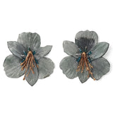 Pair of gray floral earrings with gold and blue accents on a white background