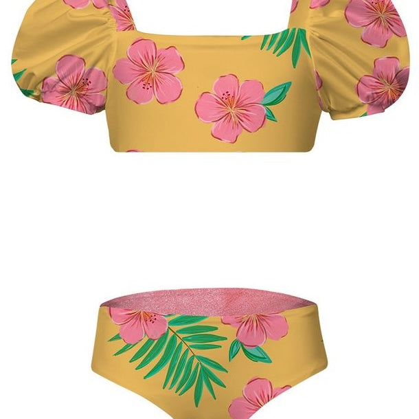 Yellow bikini top and bottom with pink floral and green leaf pattern on a white background