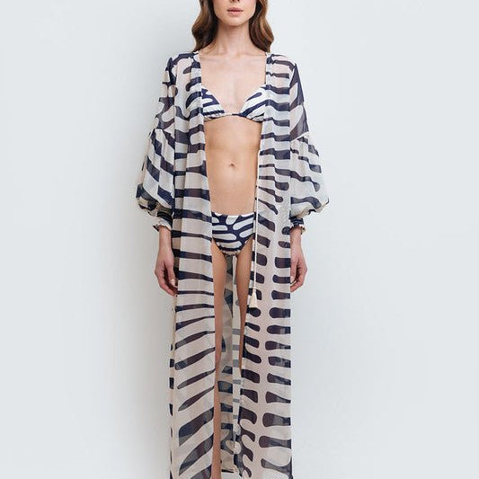 Woman wearing Sheer Kimono Cover-Up by Mar de Lua with chic pattern. Made in Colombia, available at EVAMAIA Boutique, Studio City, Los Angeles, CA.