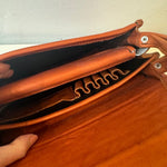 Close-up look of the inside of our Western Style leather crossbody bags. This one is Camel. It shows the pockets and details of this bag.