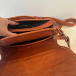 Close-up look of the inside of our Western Style leather crossbody bags. This one is Camel. It shows the pockets and details of this bag.