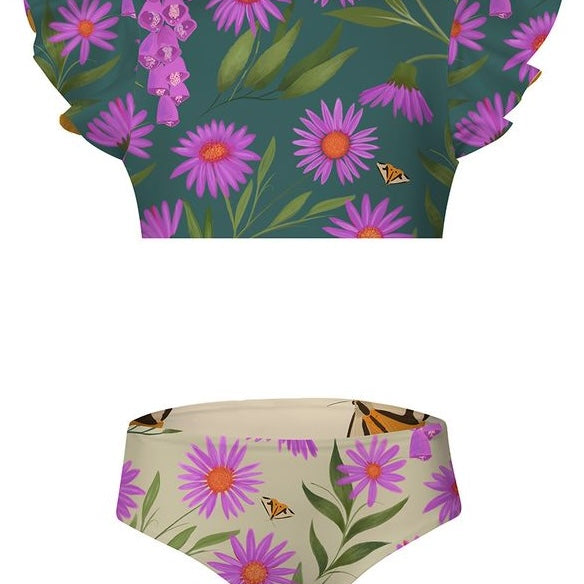 Girls two-piece bathing suit set with purple flowers and green leaves on a white background.