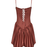 Image of the back of a brown dress by Encantadore Designer Swim and Resortwear. It's against a white background.