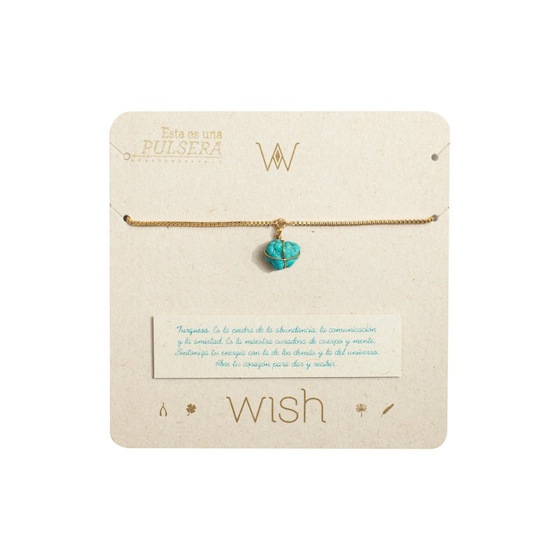Image of a gold chain bracelet with a turquoise stone on it.The purpose of the image is to highlight the bracelet because it is on sale at EVAMAIA boutique in Studio City, CA.