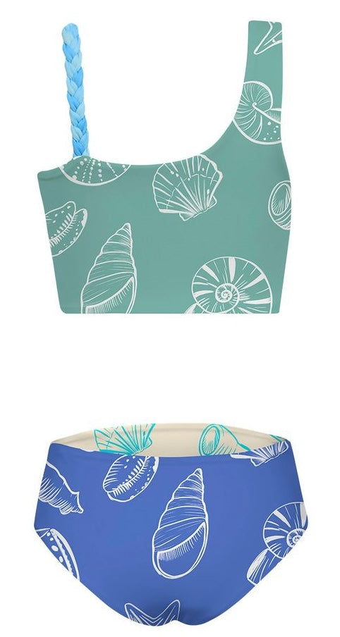 Two-piece swimsuit with shell pattern on teal top and blue bottom against a white background