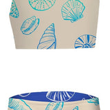 Two-piece swimsuit with shell pattern on a beige background
