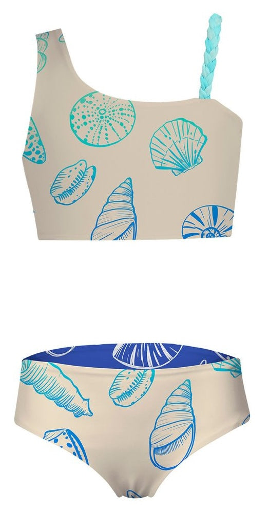 Two-piece swimsuit with shell pattern on a beige background