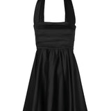 Image of a black mini halter dress by Encanrtadore Swimwear. It's against a white background. The purpose of this image is to highlight the dress because it is sold at EVAMAIA boutique in Studio City, CA. 