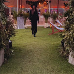 Model in velvet kimono dress in black - EVAMAIA