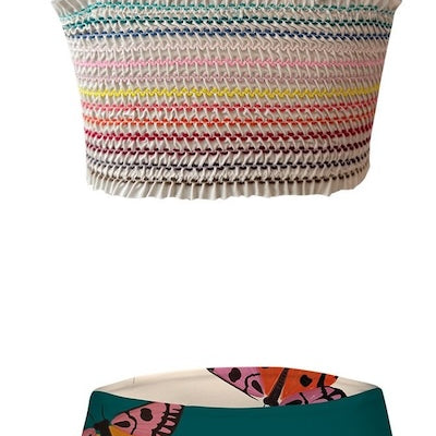 Two-piece swimsuit with colorful stripped waffle top and butterfly-patterned bottoms on a white background.