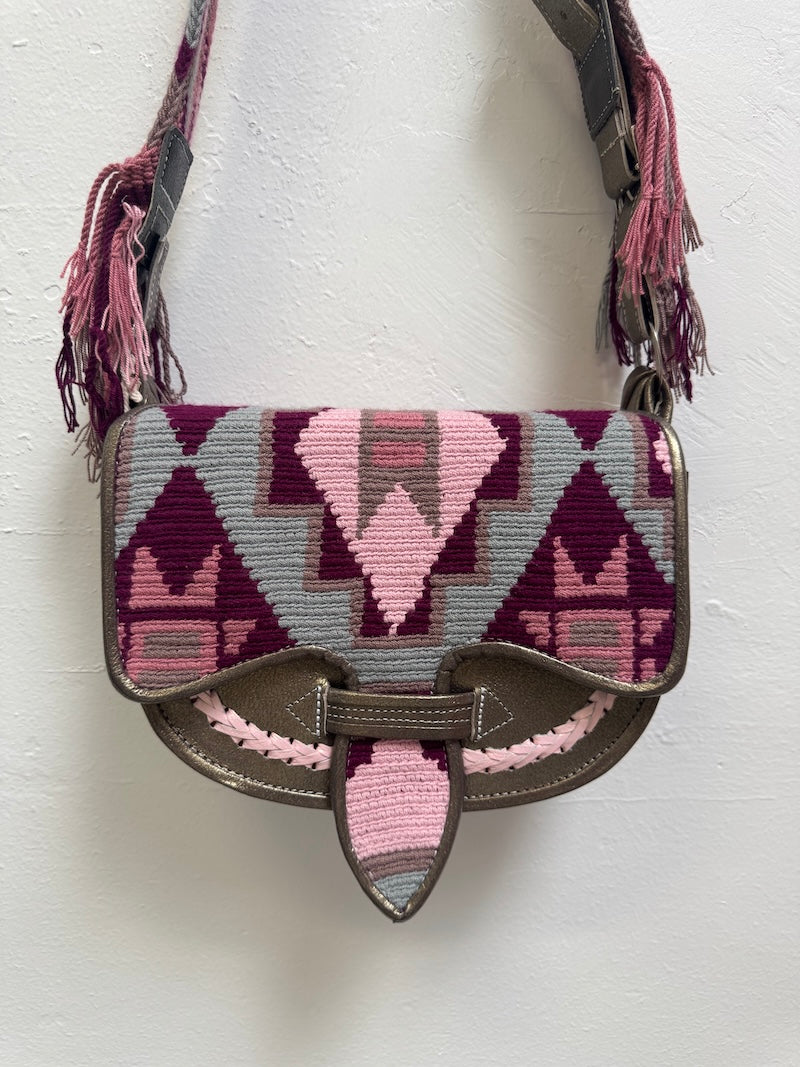 Handbag with geometric pattern on a white background