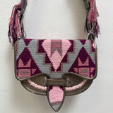 Handbag with geometric pattern on a white background