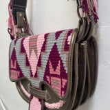 Handbag with geometric pattern on a white background