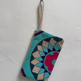 Decorative pouch with geometric pattern on a white background