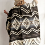 Woman modeling the back of the Arizona Poncho