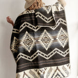 Woman modeling the back of the Arizona Poncho
