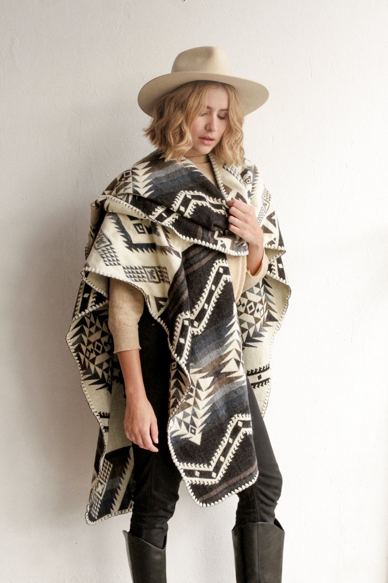 Woman modeling the side of the Arizona Poncho