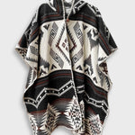 Arizona Poncho with Hood on a plain white background. The Arizona poncho features different brown tones in a full geometric pattern.