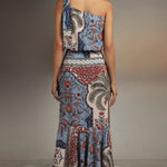 back of model wearing dorotea pampa skirt with on plain background